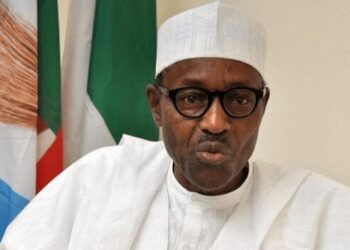 Were working hard to restructure Nigerias battered economy Buhari