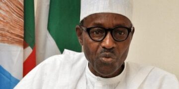 Were working hard to restructure Nigerias battered economy Buhari