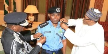 Buhari decorates the new Police IGP