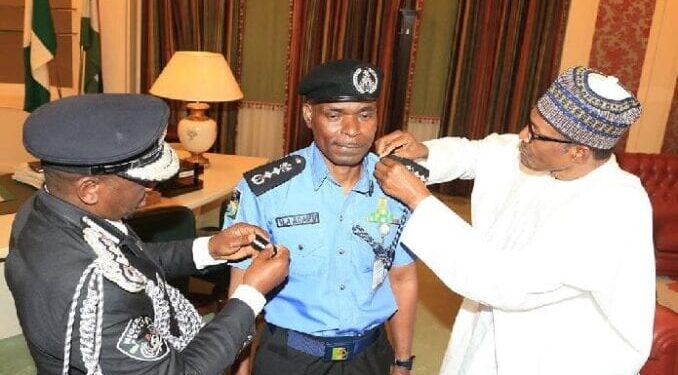 Buhari decorates the new Police IGP