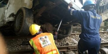 train collides with bus in Lagos